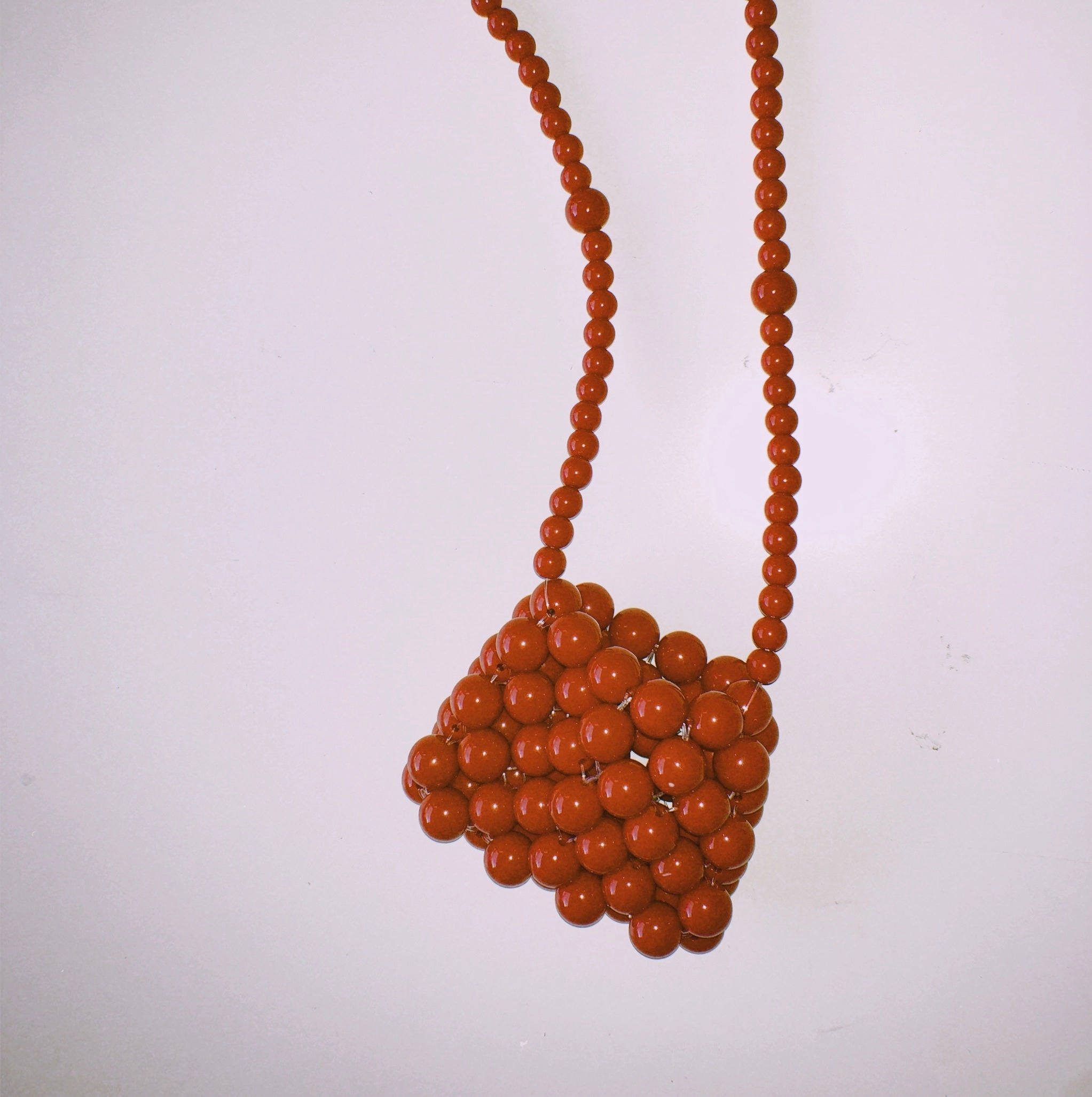 The Crimson Micro Sling Bag by Veronique